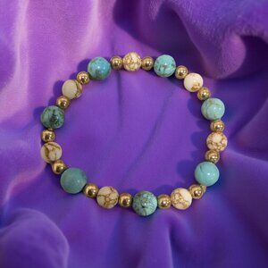 Turquoise & Marble beaded bracelet w gold spacers  7 inches